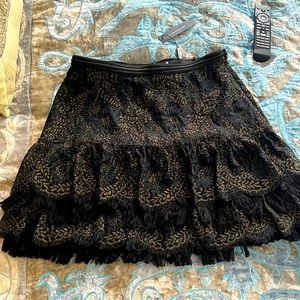 BEAUTIFUL ELIE TAHARI BLACK AND GOLD LACE TIERED SKIRT